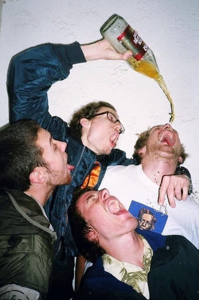 Friends pouring drinks, disposable camera flash